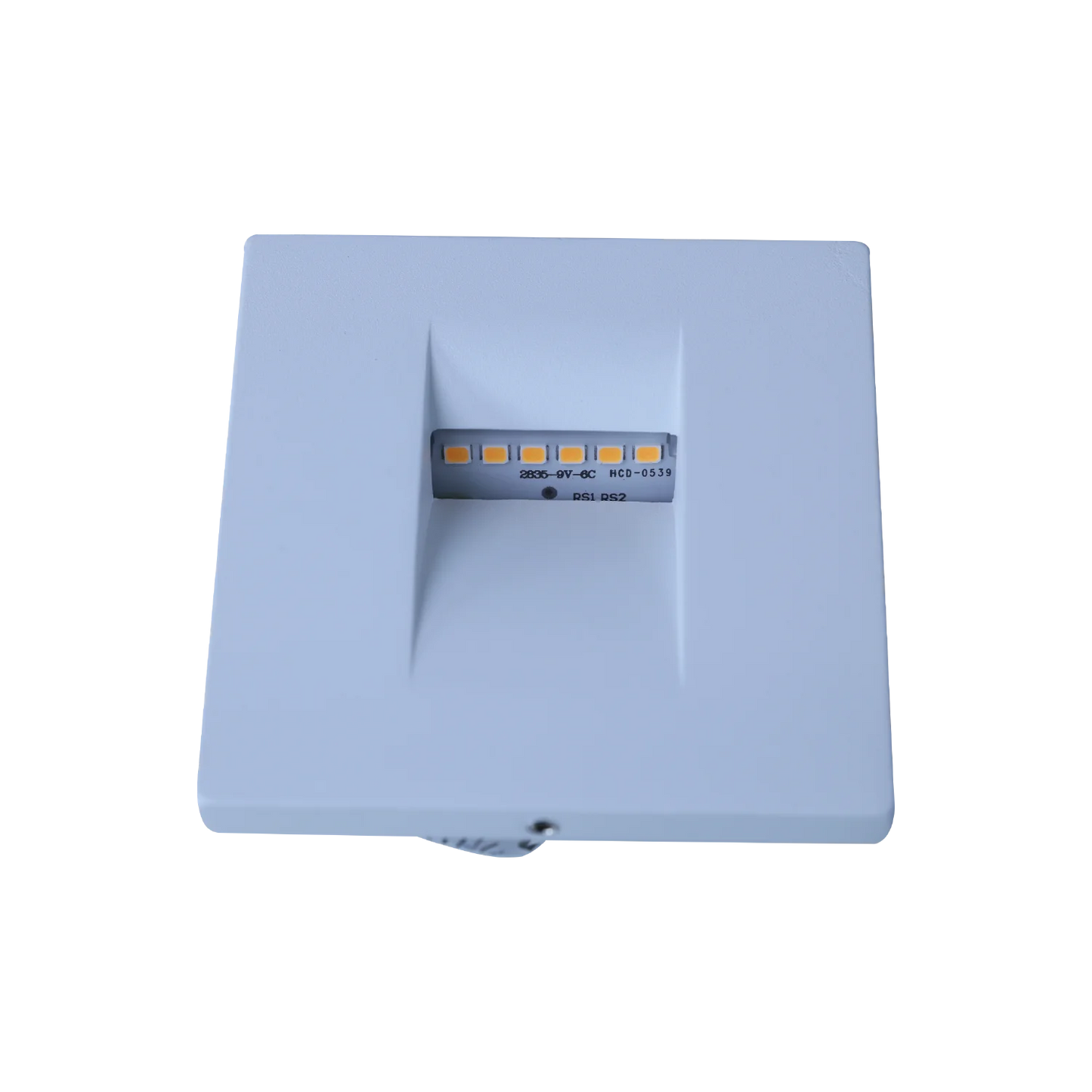 Rectangular blue electronic component on a white background