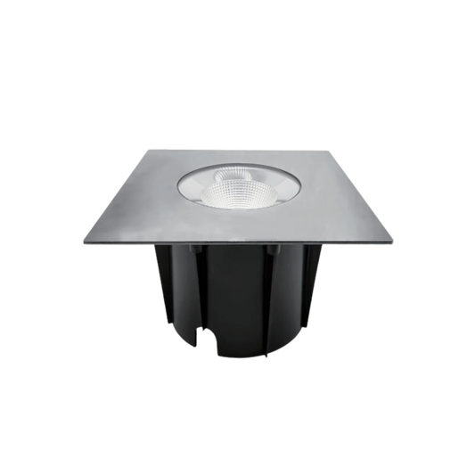 A recessed LED light fixture in a chrome finish with a clear glass cover, designed to be installed in the ground.